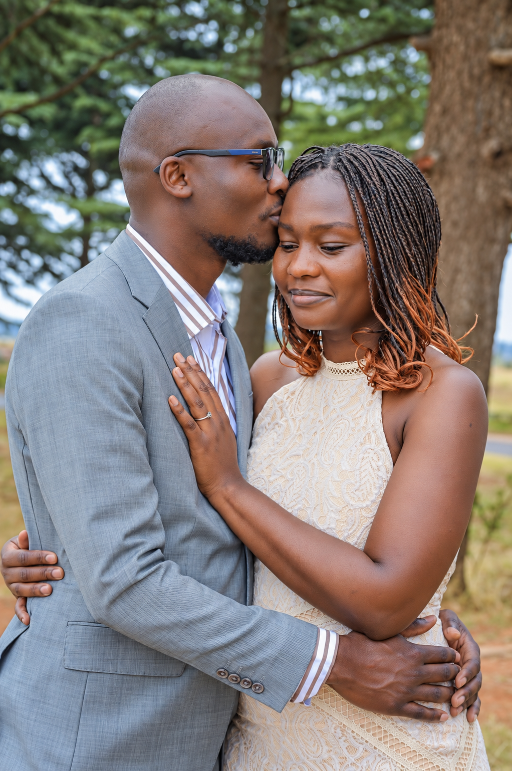 Couple sharing a tender embrace outdoors